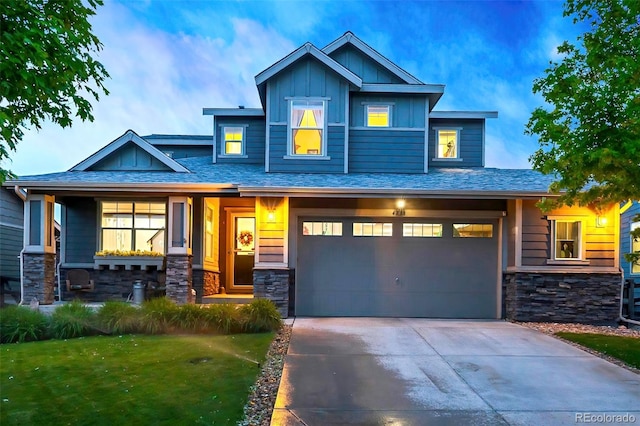 4738 Colorado River Dr, Firestone, CO 80504 - craftsman inspired home featuring board and batten siding, a garage, stone siding, and concrete driveway