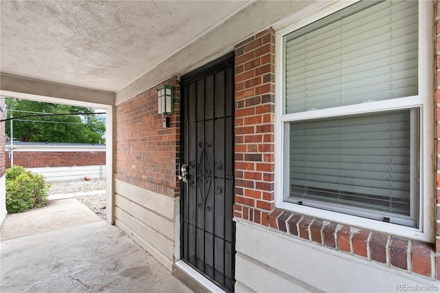 entrance to property with covered porch