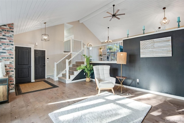 unfurnished room with high vaulted ceiling, ceiling fan, beam ceiling, wood-type flooring, and wood ceiling