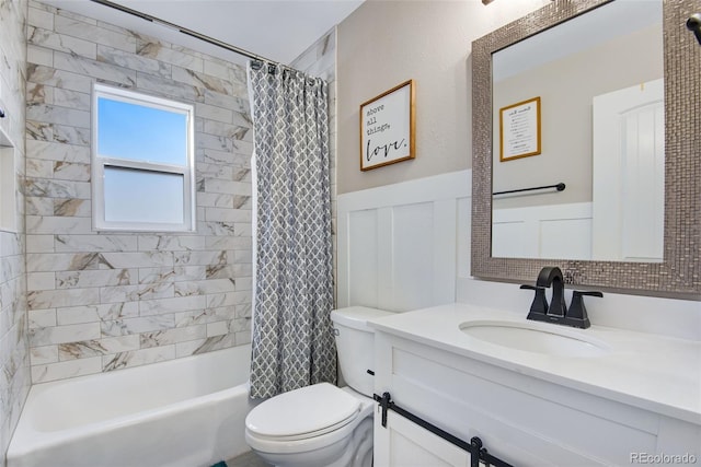 full bathroom with shower / bath combination with curtain, vanity, and toilet