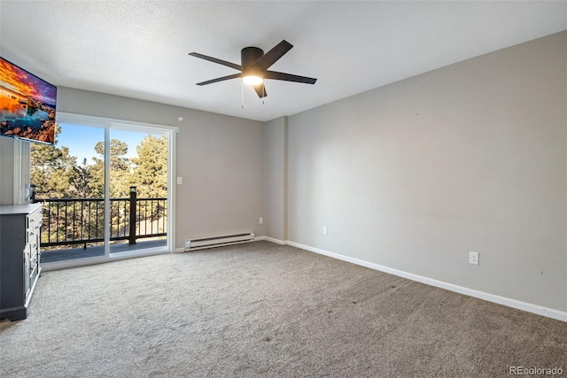 carpeted spare room with ceiling fan and a baseboard radiator