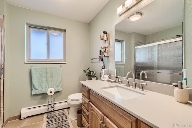 full bath with toilet, an enclosed shower, a baseboard heating unit, vanity, and tile patterned floors