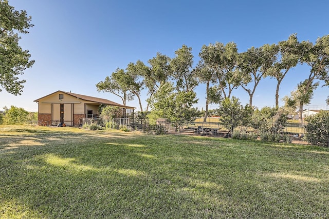 view of yard with fence