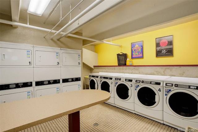 common laundry area featuring stacked washer / dryer and independent washer and dryer