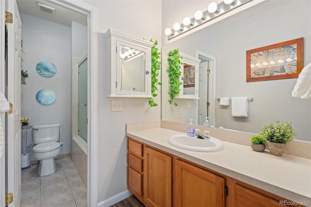 full bathroom featuring vanity, tile patterned floors, combined bath / shower with glass door, and toilet