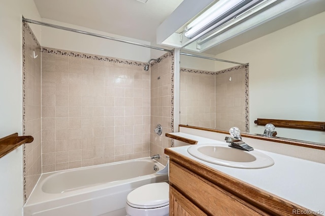 bathroom featuring shower / washtub combination, vanity, and toilet