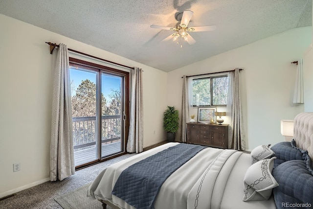 bedroom featuring baseboards, lofted ceiling, carpet floors, a textured ceiling, and access to outside