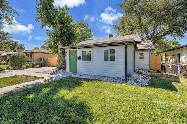 view of front of home with a front yard