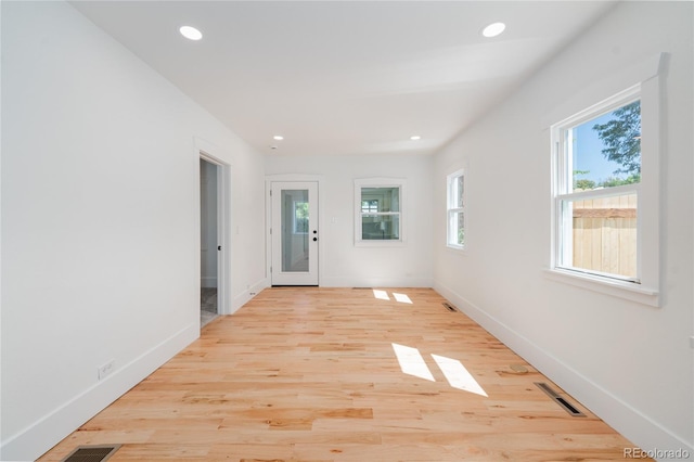 empty room featuring light hardwood / wood-style floors