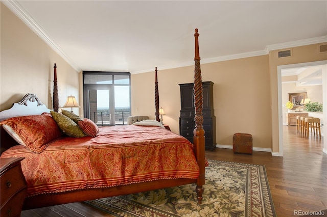 8100 E Union Ave Unit 1502, Denver, CO 80237 - bedroom featuring ornamental molding, wood finished floors, and baseboards
