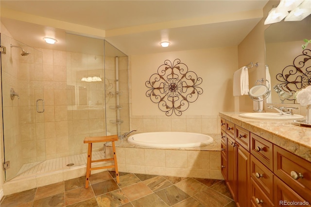 8100 E Union Ave Unit 1502, Denver, CO 80237 - full bathroom featuring a bath, a stall shower, and vanity