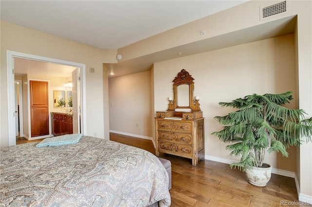 8100 E Union Ave Unit 1502, Denver, CO 80237 - bedroom with wood finished floors and baseboards