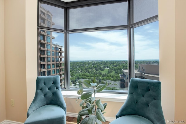 8100 E Union Ave Unit 1502, Denver, CO 80237 - sitting room with wood finished floors and baseboards