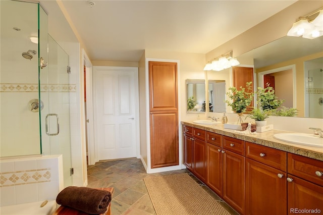 8100 E Union Ave Unit 1502, Denver, CO 80237 - bathroom with double vanity and a stall shower