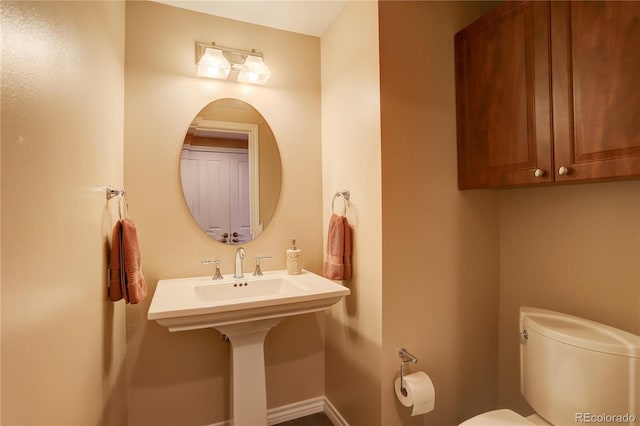 8100 E Union Ave Unit 1502, Denver, CO 80237 - bathroom with toilet and baseboards