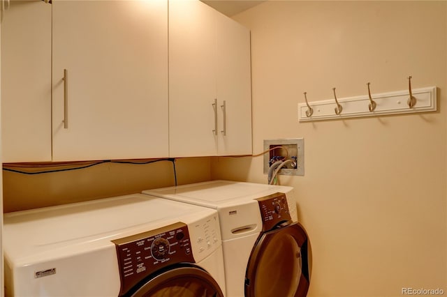 8100 E Union Ave Unit 1502, Denver, CO 80237 - laundry room featuring cabinet space and washer and dryer