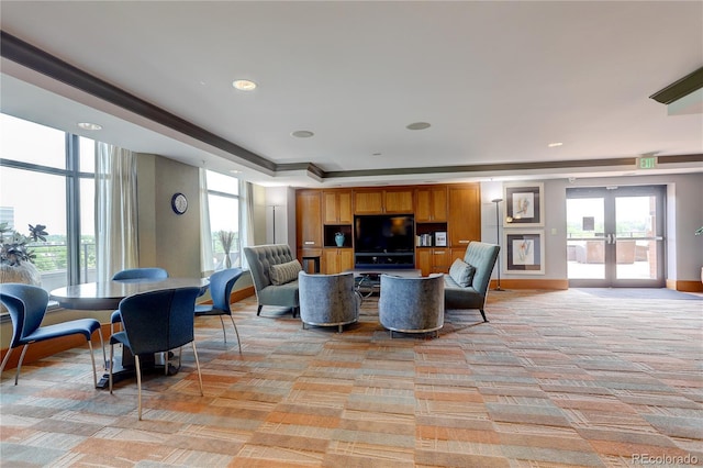8100 E Union Ave Unit 1502, Denver, CO 80237 - living room with light colored carpet, baseboards, french doors, and a tray ceiling