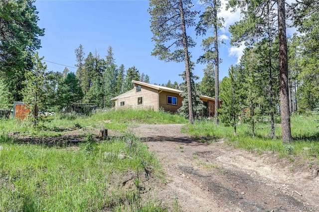 10893 Milliken Ave, Conifer, CO 80433 - view of yard with dirt driveway