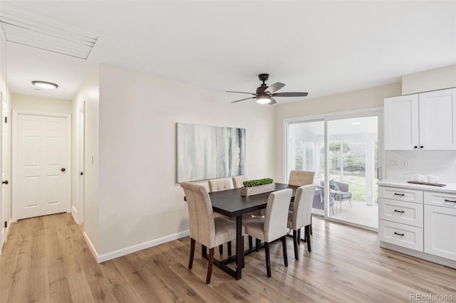 dining area featuring ceiling fan, baseboards, and light wood finished floors
