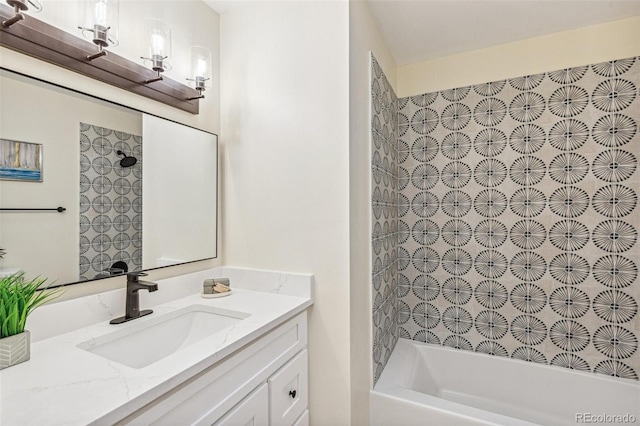 bathroom featuring vanity and shower / bath combination