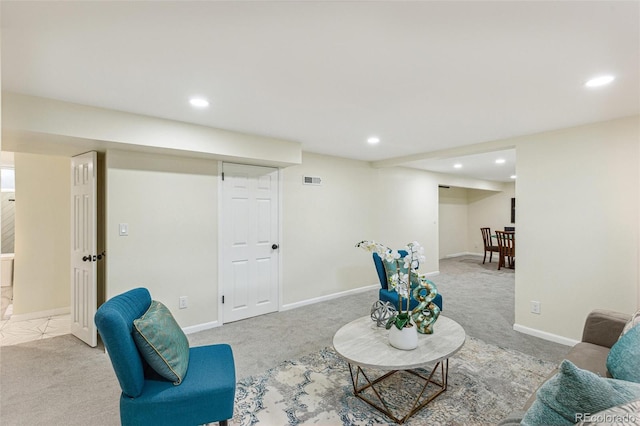 living area featuring recessed lighting, carpet, and baseboards