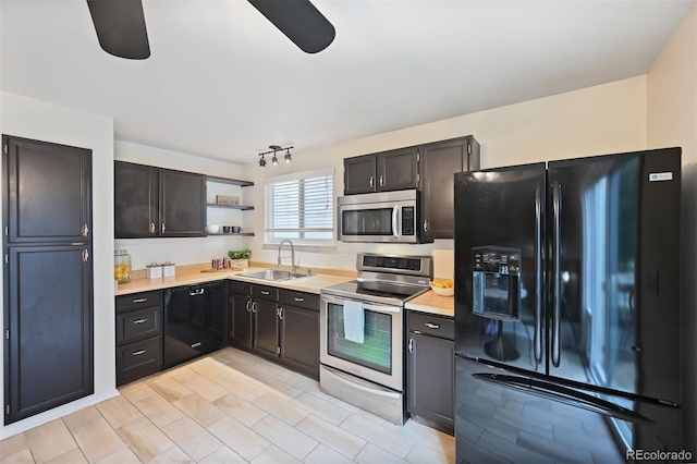 5602 S Yank Ct, Littleton, CO 80127 - kitchen featuring appliances with stainless steel finishes, a ceiling fan, and light countertops