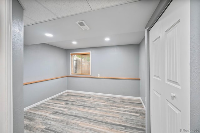 5602 S Yank Ct, Littleton, CO 80127 - below grade area featuring wood finished floors and recessed lighting