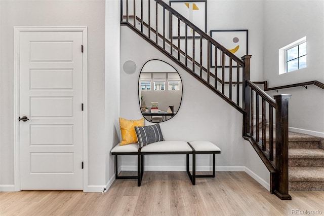2110 Wagon Wheel Aly, Brighton, CO 80601 - stairway featuring wood finished floors and baseboards