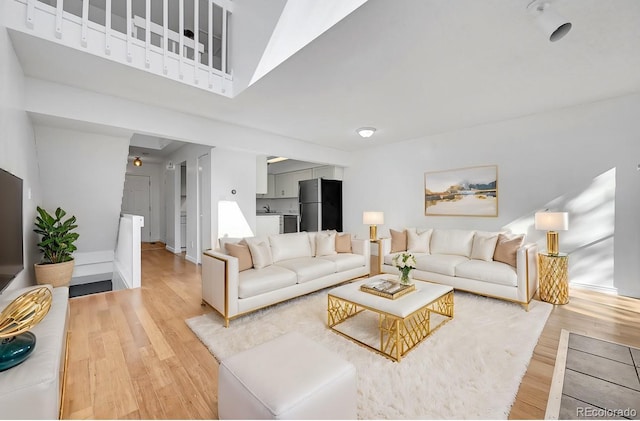 living room featuring light wood-type flooring