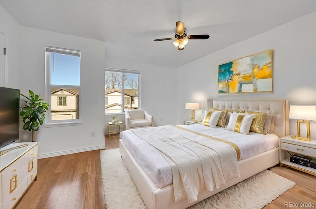 bedroom featuring ceiling fan and light wood-type flooring