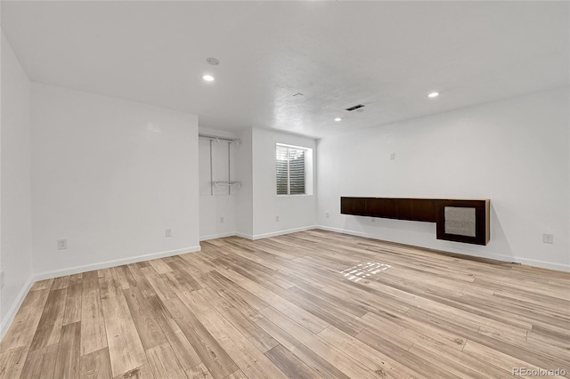 empty room with light wood-type flooring