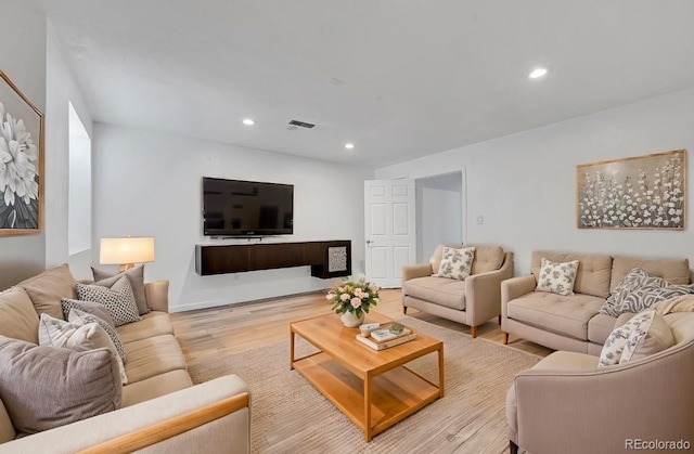 living room featuring light wood-type flooring