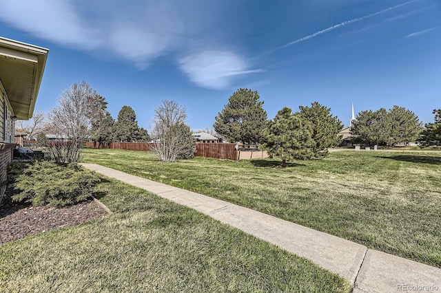 view of yard featuring fence