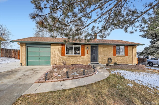 single story home with an attached garage, driveway, roof with shingles, and brick siding