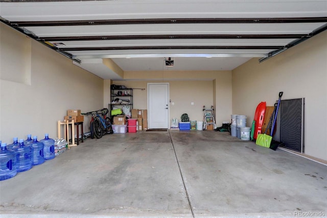 garage featuring a garage door opener