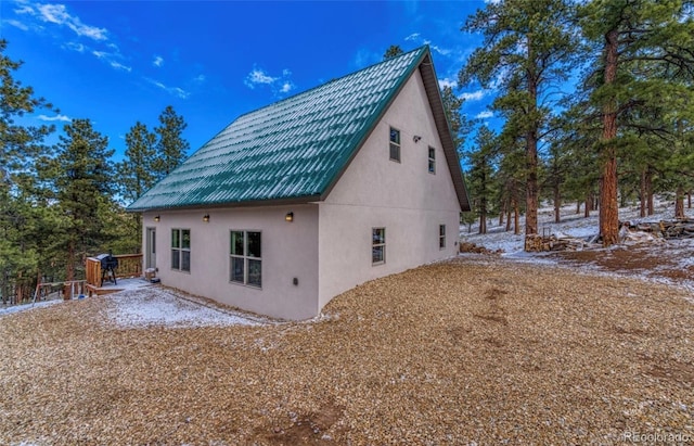 1443 Sangre Dr, Westcliffe, CO 81252 - view of side of property with stucco siding