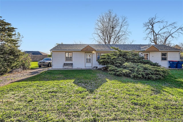 ranch-style house featuring a front yard