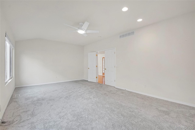 carpeted empty room with baseboards, a ceiling fan, visible vents, and recessed lighting