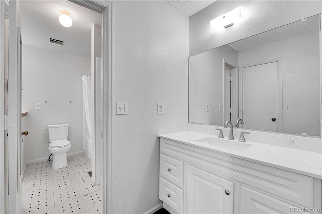 10143 Quivas St, Thornton, CO 80260 - bathroom with vanity, a textured ceiling, shower / tub combo, and a textured wall
