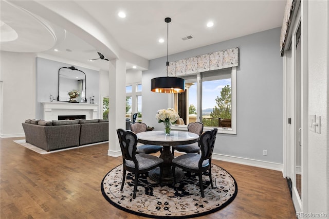 dining space featuring hardwood / wood-style flooring