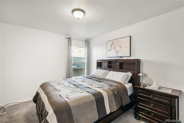 bedroom featuring carpet