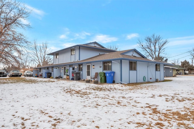 view of snow covered property