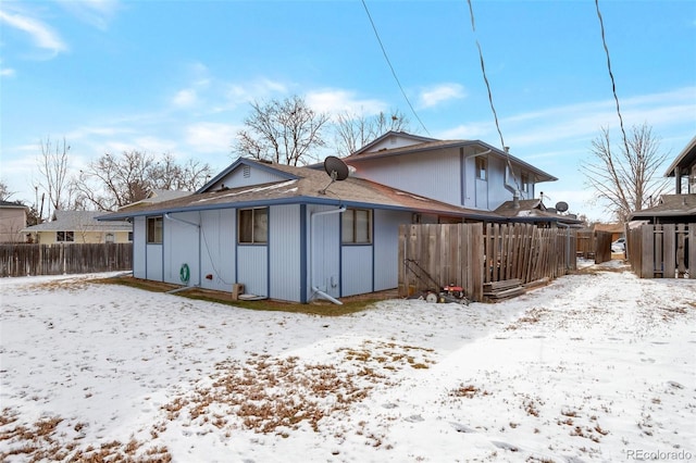 view of snow covered property