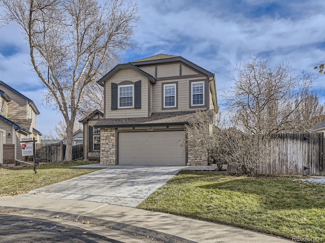 view of front facade featuring a garage, concrete driveway, a front yard, and fence