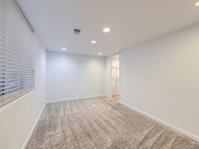 view of carpeted spare room