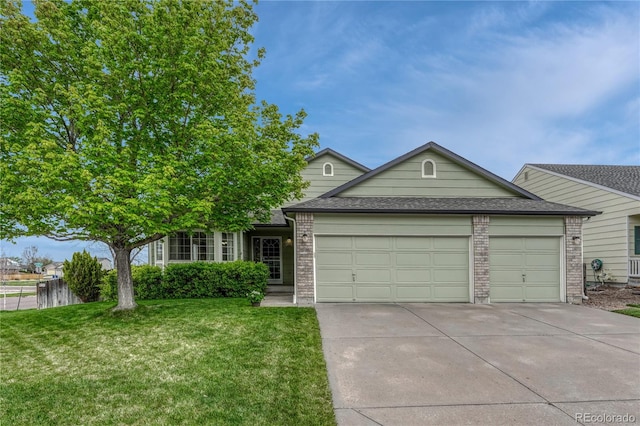 5350 S Quail Way, Littleton, CO 80127 - view of front facade featuring a garage, driveway, and brick siding