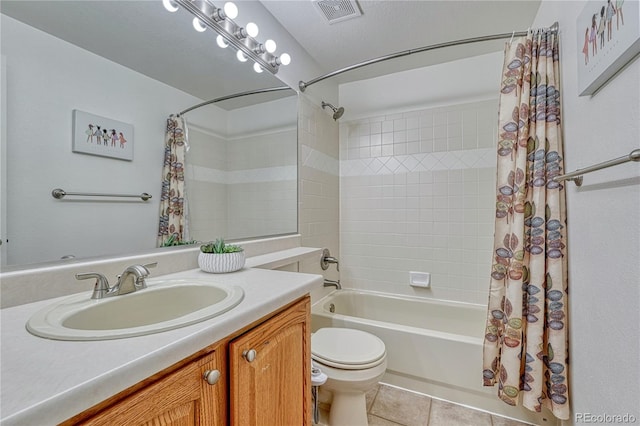5350 S Quail Way, Littleton, CO 80127 - full bath featuring shower / bath combination with curtain, toilet, tile patterned flooring, and vanity
