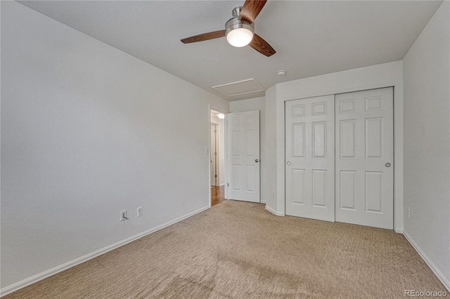 5350 S Quail Way, Littleton, CO 80127 - unfurnished bedroom with carpet floors, attic access, baseboards, a closet, and ceiling fan
