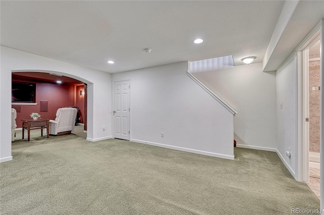 5350 S Quail Way, Littleton, CO 80127 - basement featuring carpet, arched walkways, baseboards, and recessed lighting