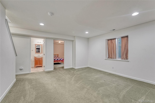 5350 S Quail Way, Littleton, CO 80127 - unfurnished bedroom featuring recessed lighting, carpet, baseboards, connected bathroom, and a sink